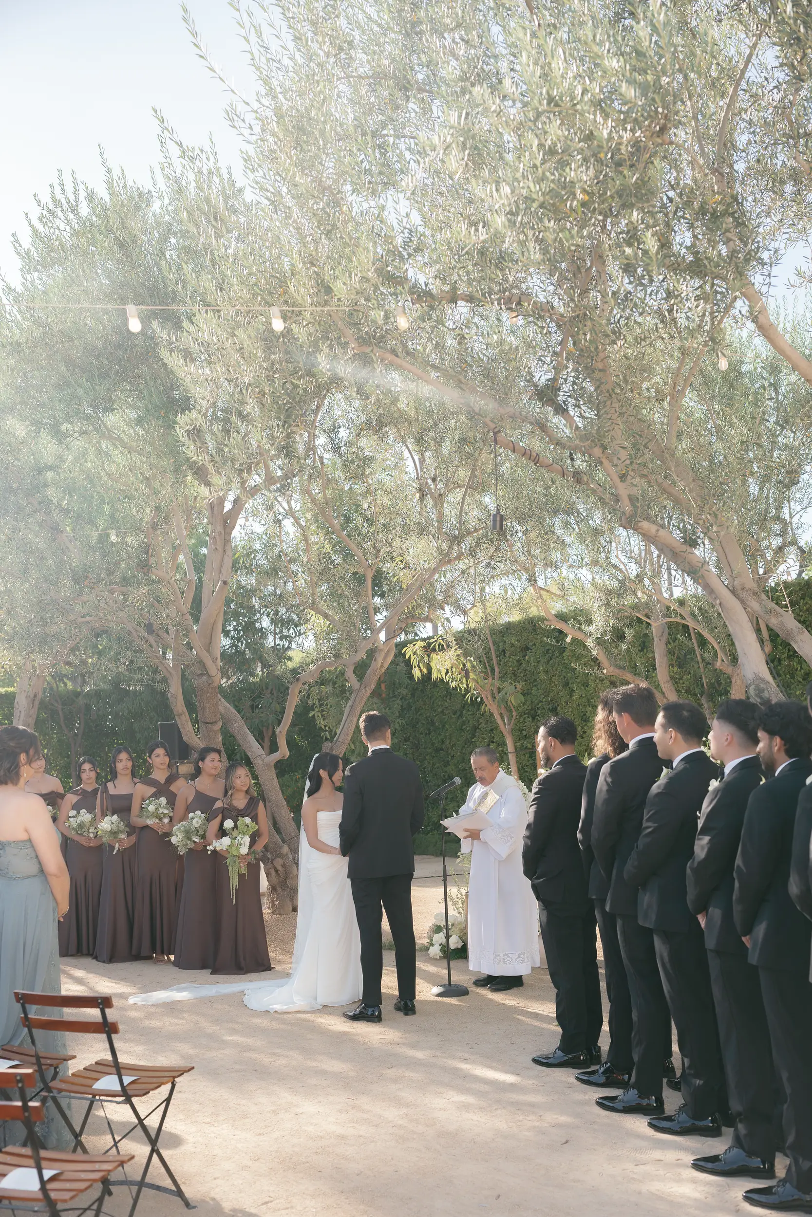 bride and groom share vows
