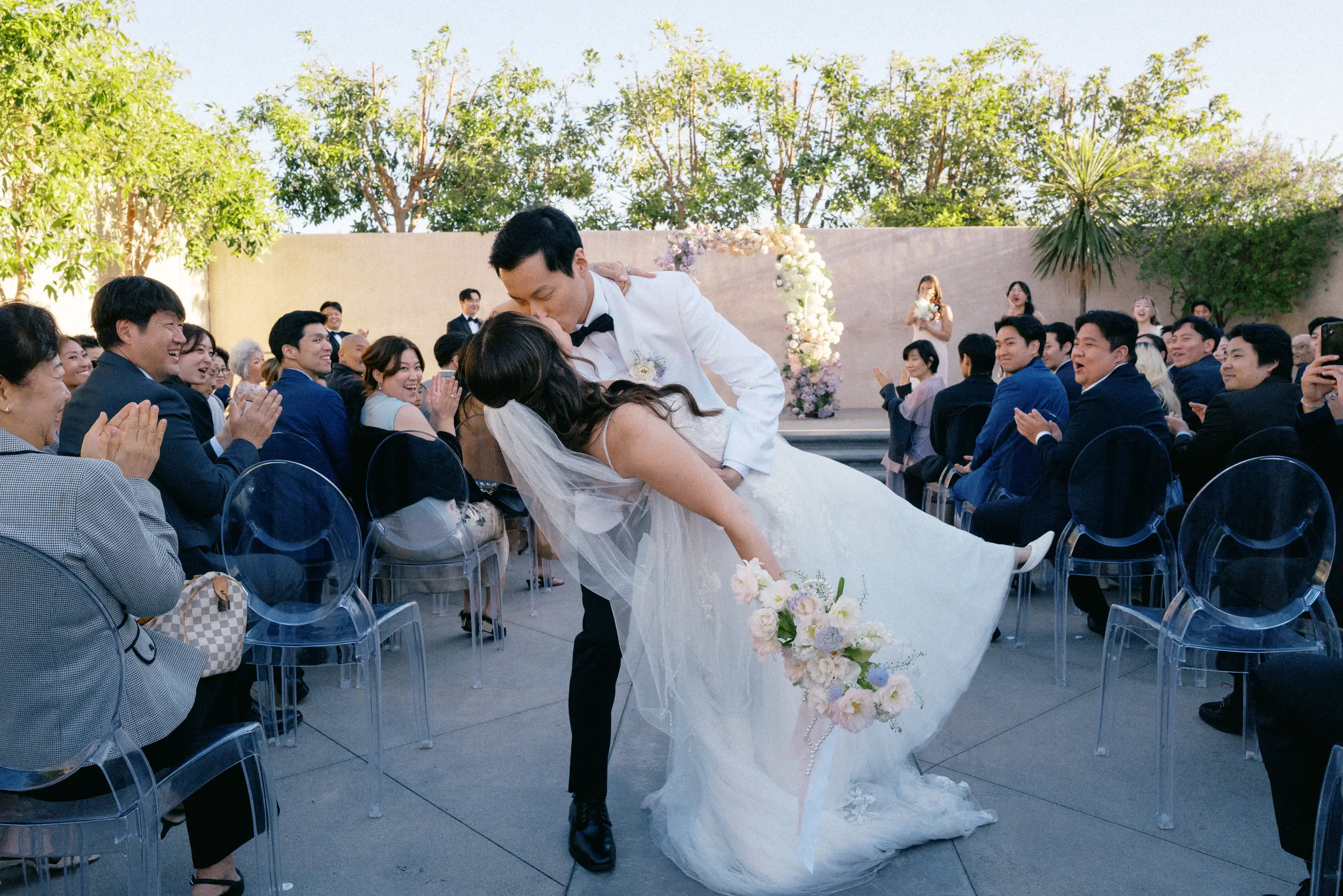 Bride and groom kiss at the end of their ceremony.