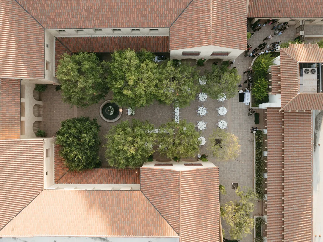 Overhead view of the tiled-roof courtyard and reception tables.