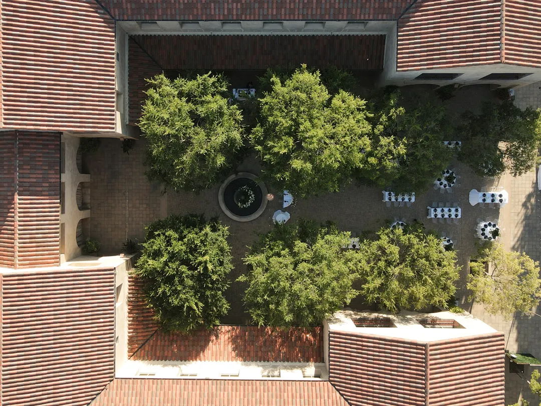 Overhead view of the courtyard fountain and reception tables.