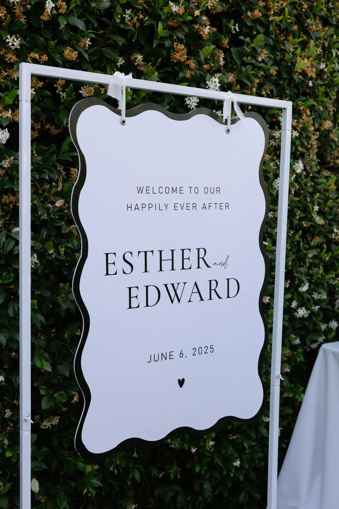 Esther and Edward's wedding welcome sign at Hangar 21 South.
