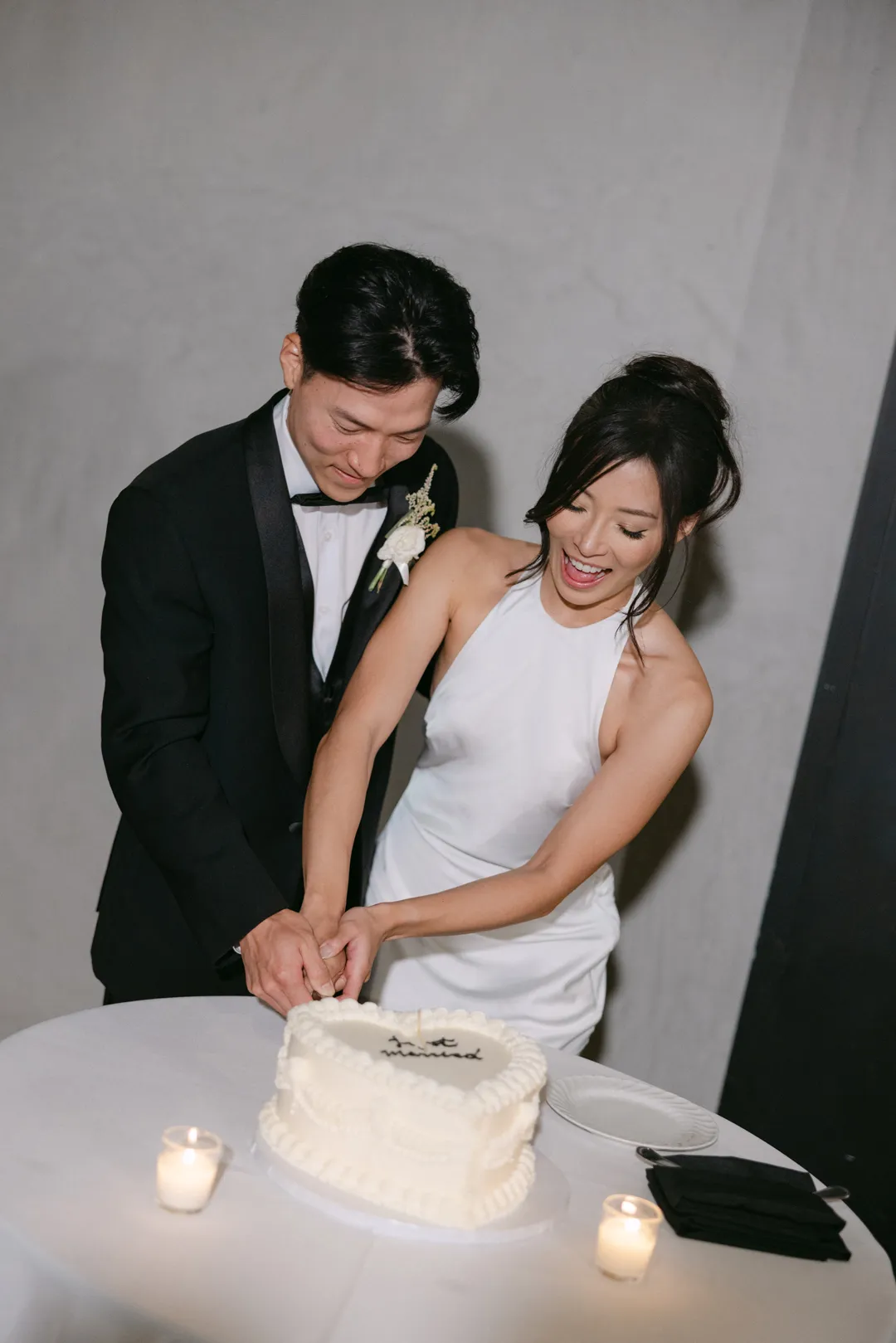 Wedding couple cutting their Jay's Catering Vintage Heart Cake.