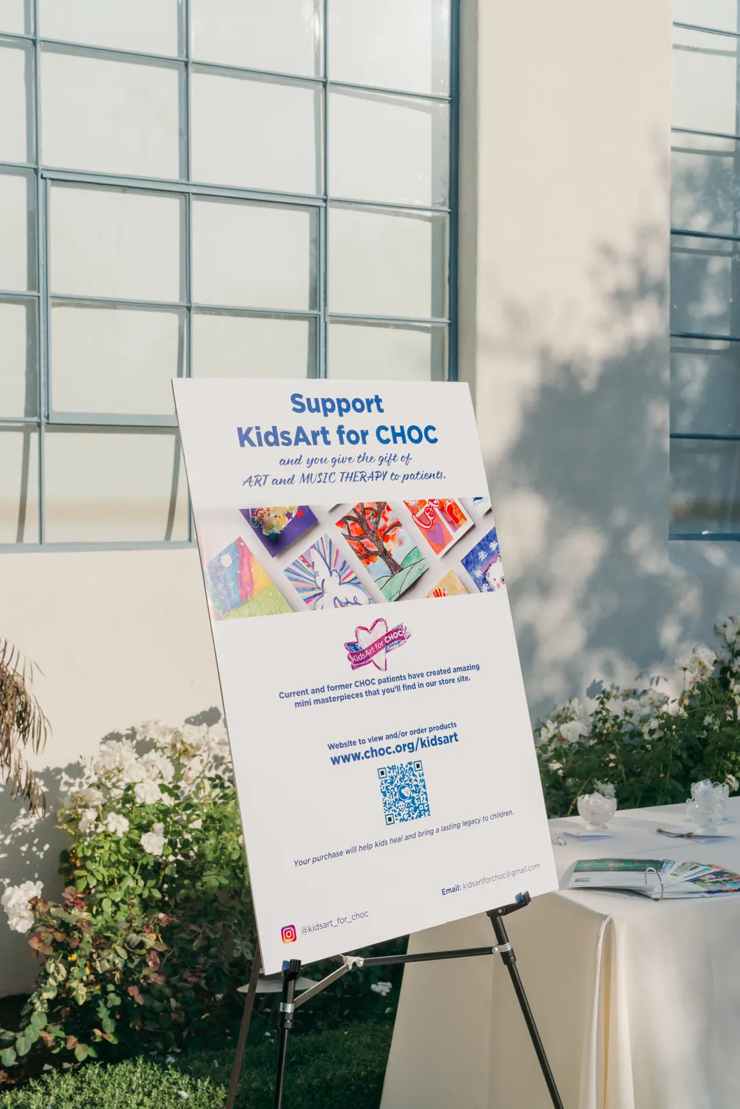 Support KidsArt for CHOC sign at Grand Gimeno's Halloween gathering.