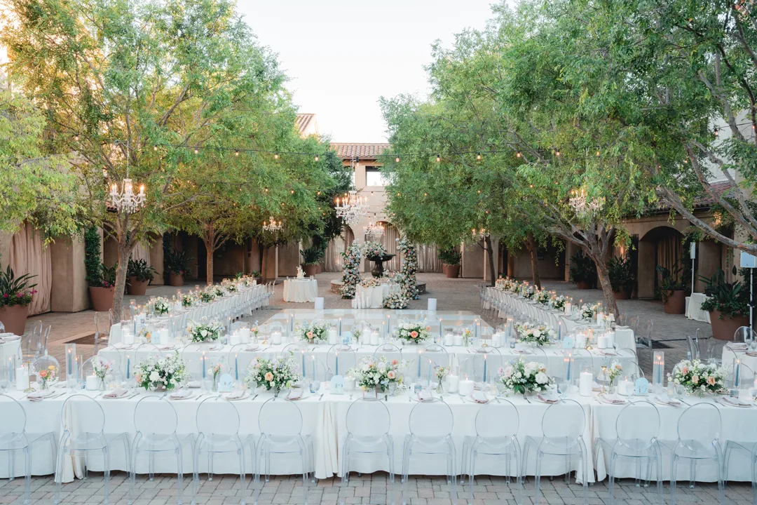 Long reception tables arranged around the Serra Plaza courtyard.