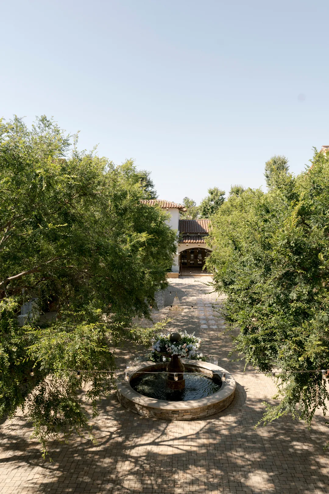 Elevated view of the Serra Plaza courtyard and its central fountain.