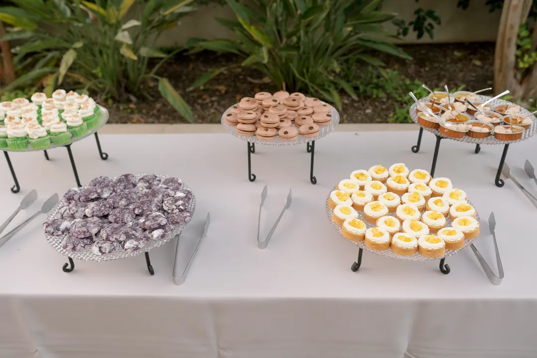 Jay's Catering Taste of Asia Dessert Station with tarts, cookies, cupcakes, macarons and flan.