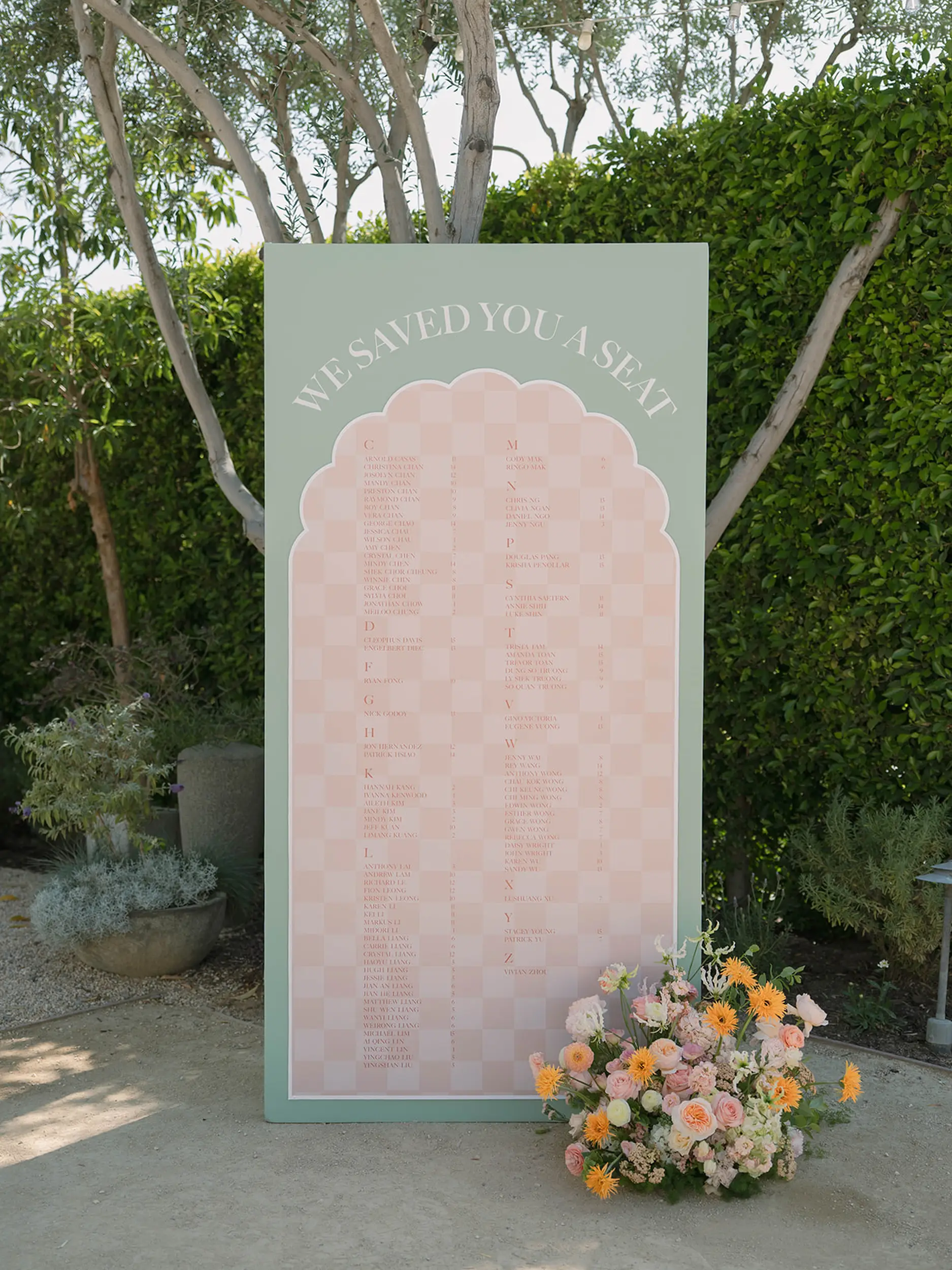 Modern sage and blush wedding seating chart.