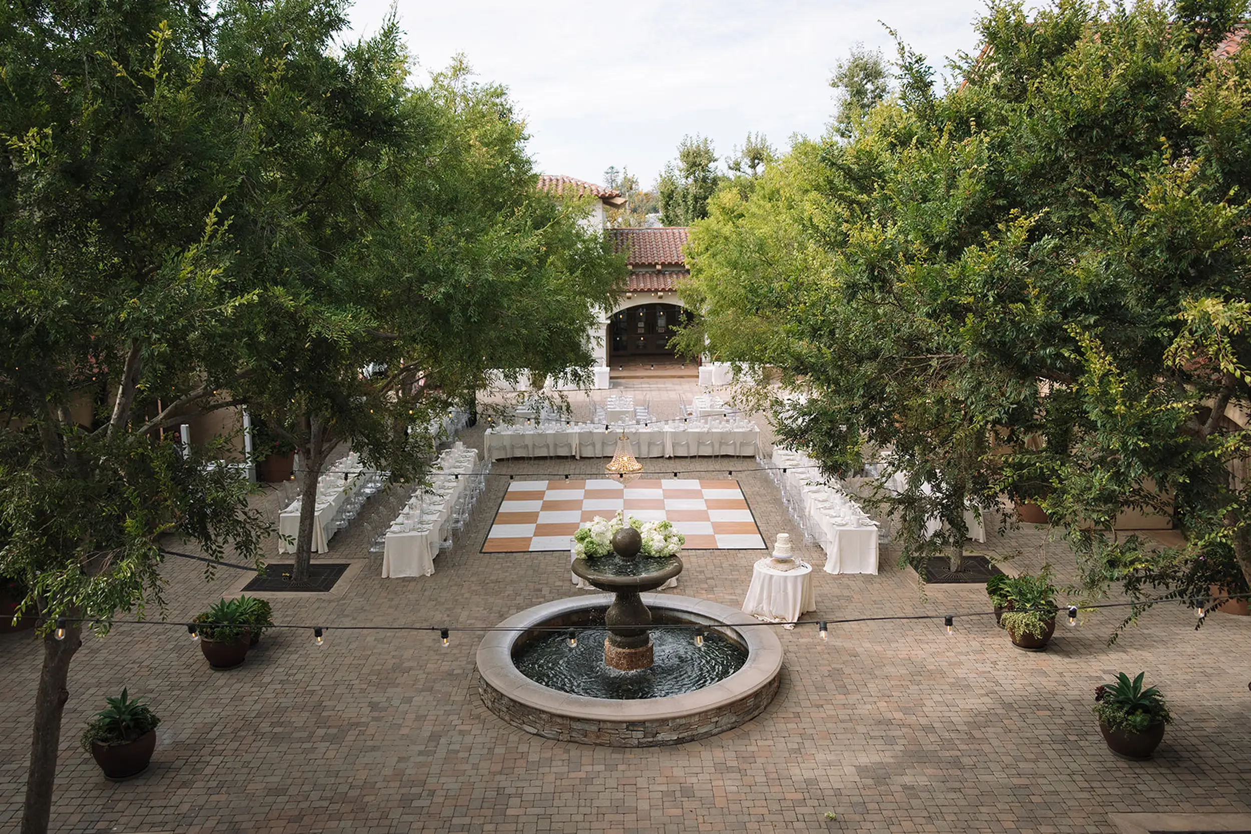 Outdoor summer wedding at Serra Plaza in San Juan Capistrano.