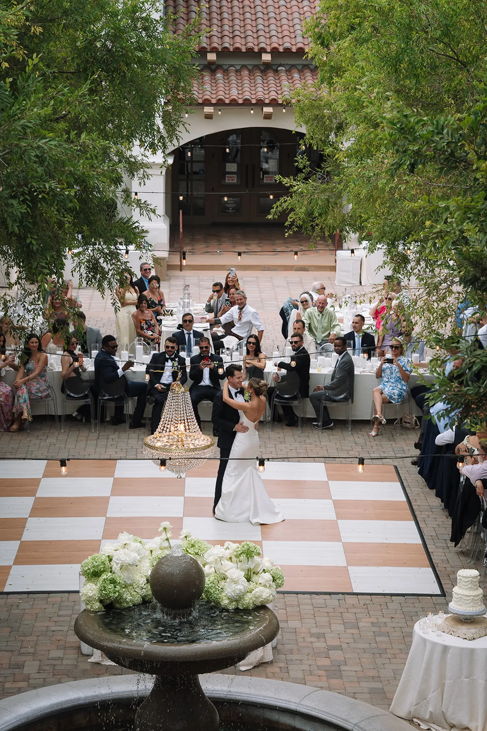 Outdoor summer wedding at Serra Plaza in San Juan Capistrano.