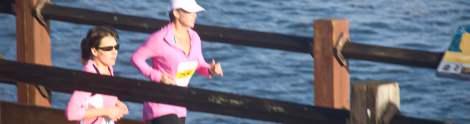two ladies running during a marathon