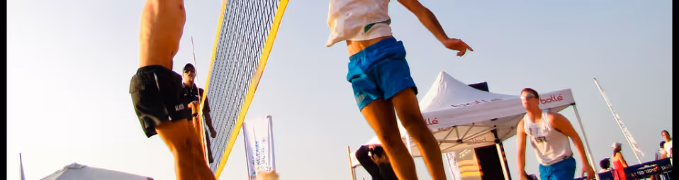 people playing beach volleyball