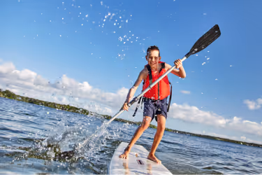 Kid paddleboarding