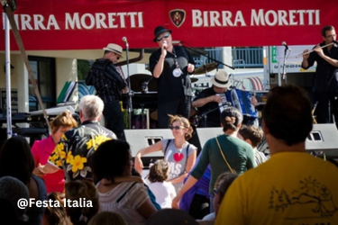 Concert at Festa Italia with people dancing