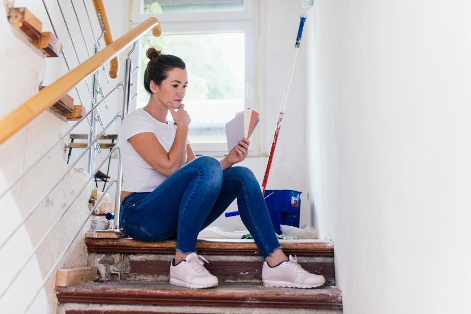 woman sitting on the stairs