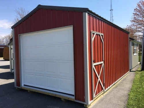 Red prefab garage with side door