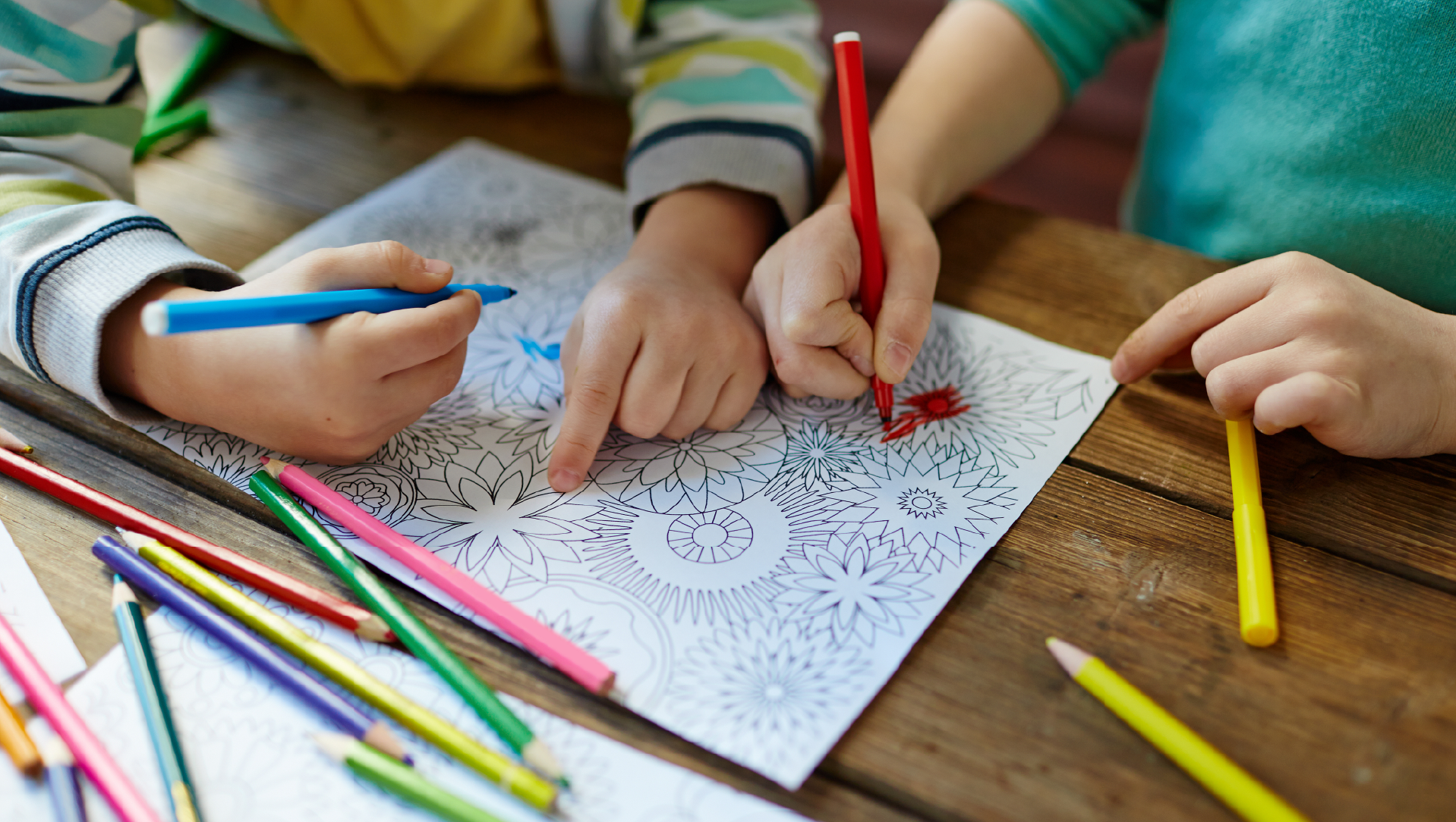 Kids working on a Coloring Page