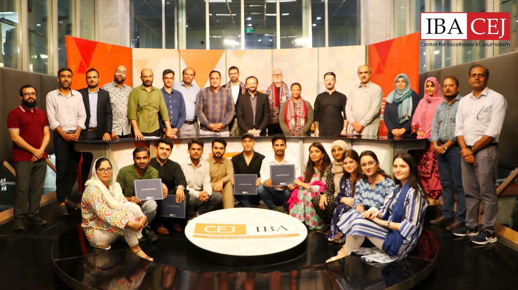AidData instructors and course partners stand with graduates of the AidData/CEJ-IBA data journalism training in Karachi, Pakistan. Photo courtesy of CEJ-IBA, used with permission. 