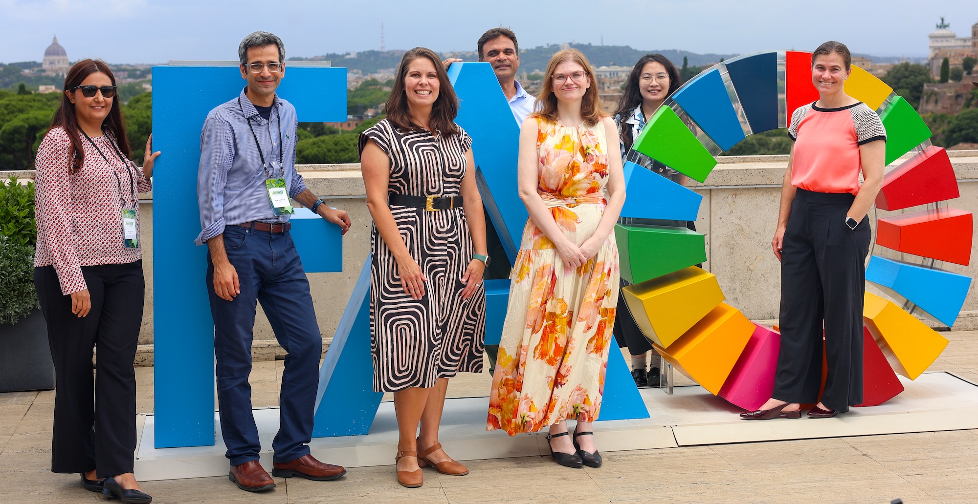 A team from AidData is shown on the roof of the United Nations’ Food and Agriculture Organization headquarters in Rome. From left: Sara Sayedi, Ariel BenYishay, Jessica Wells, Kunwar Singh, Rachel Sayers, Yuntian Bi and Katherine Nolan. Photo by Sam Gruber.