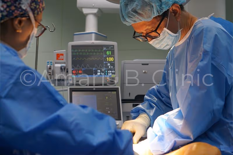 Dr Ivan Puah performing liposuction in Singapore