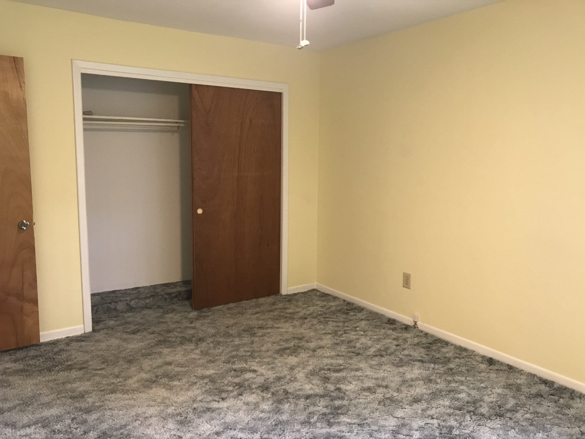 2nd bedroom with carpet