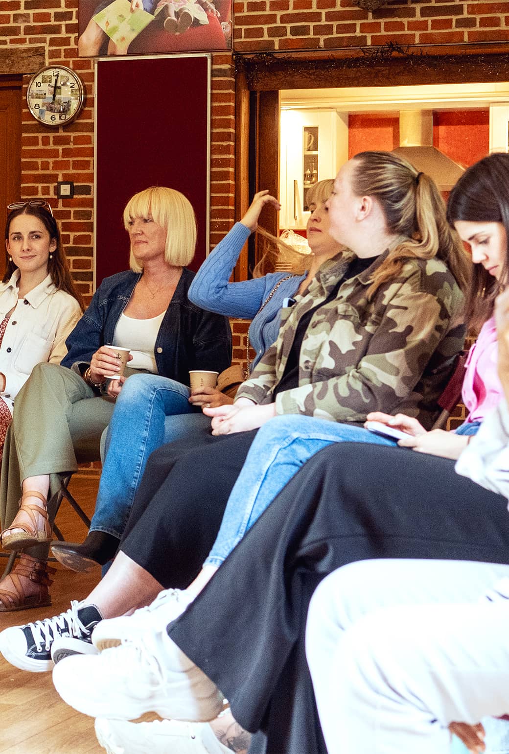 A group of women at Sapphire laughing with each other