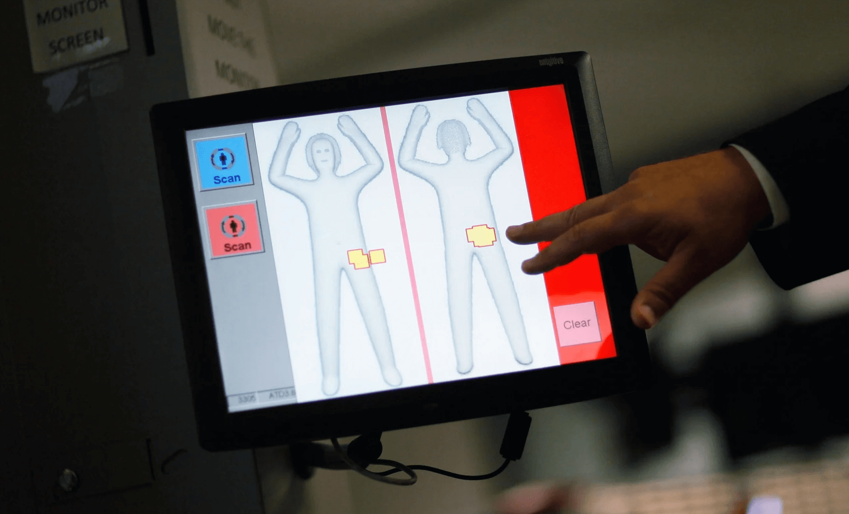 TSA airport full body scanner screen with binary gender options