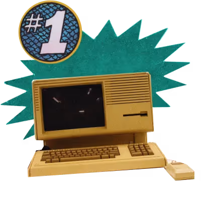 an old school computer with an external keyboard and mouse