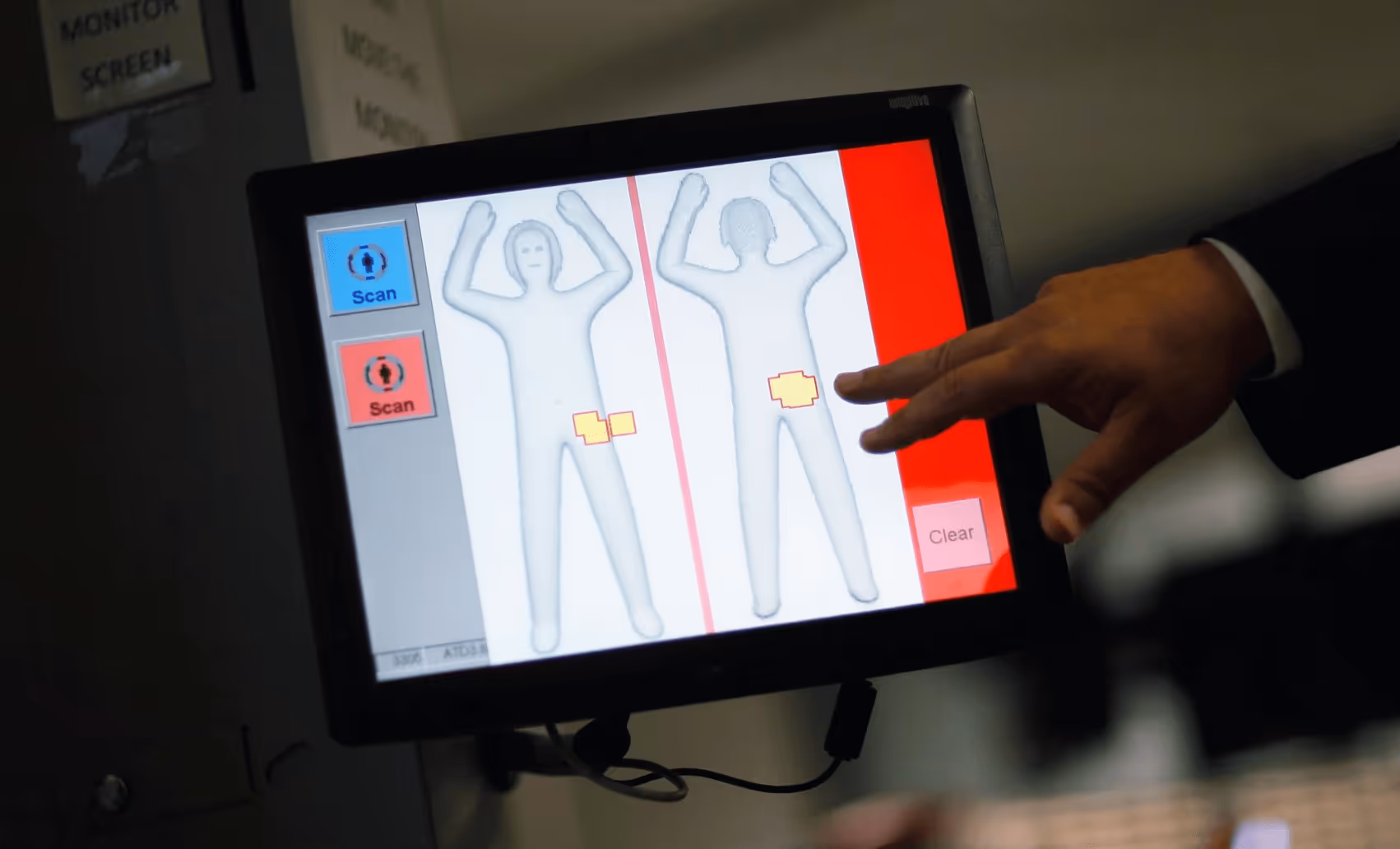TSA airport full body scanner screen with binary gender options