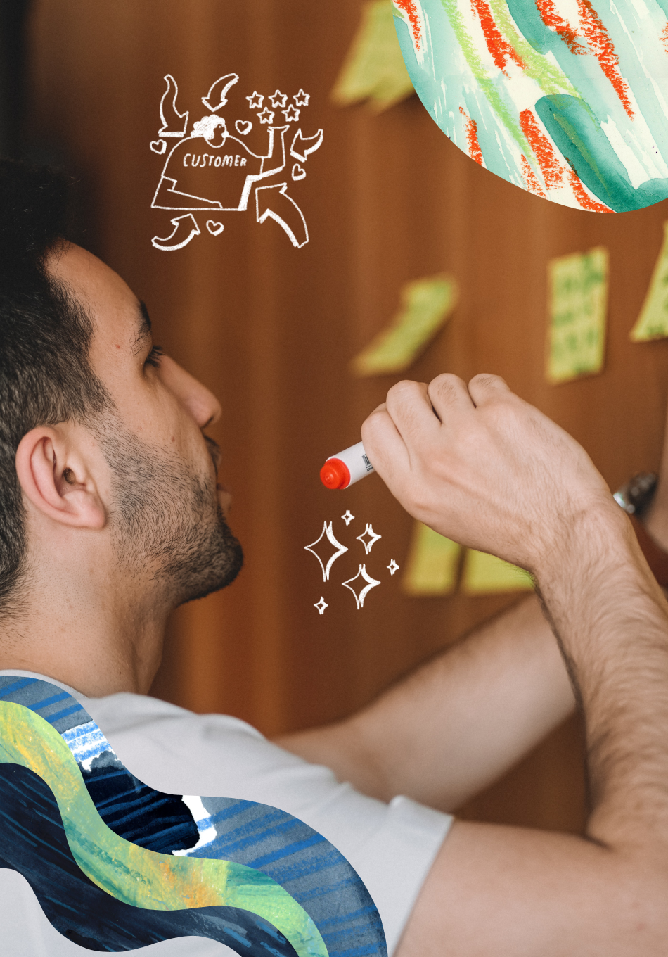 person writing at board with post-it notes