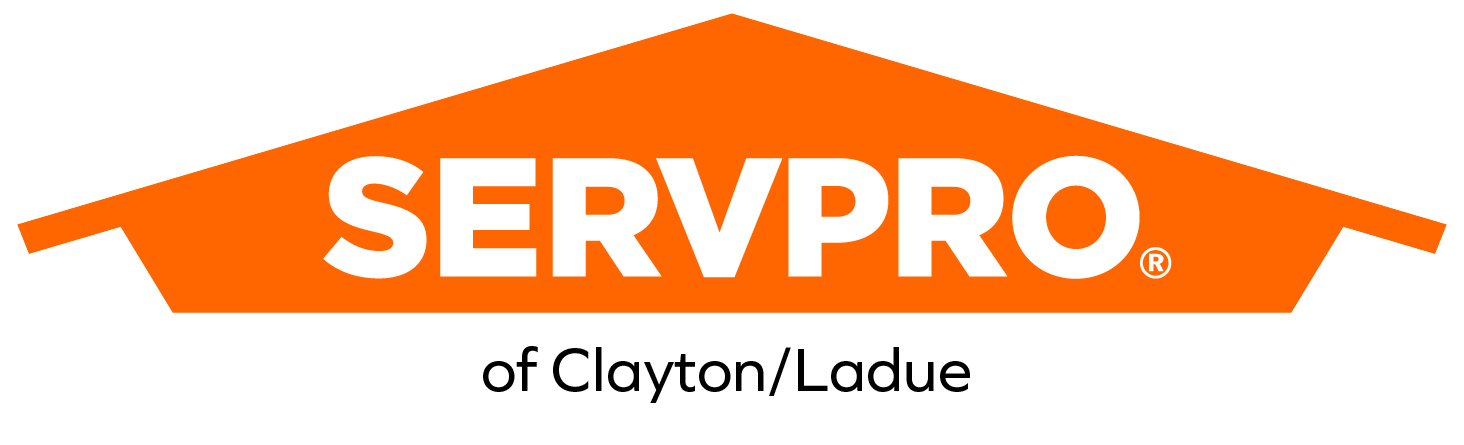 SERVPRO logo in bold white text on an orange house-shaped background with 'of Clayton/Ladue' below.