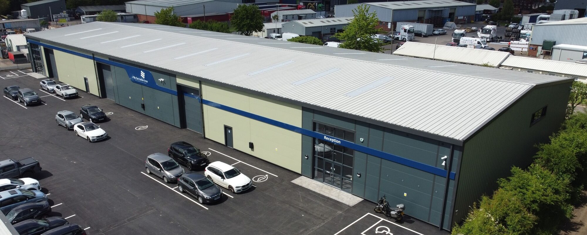 Cars parked in large storage park