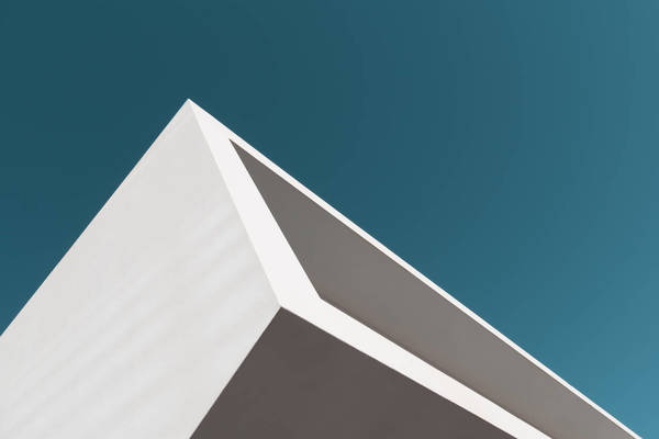 Low Angle View Of Modern Building Against Clear Sky