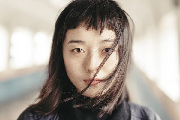 Portrait Of Woman With Black Hair