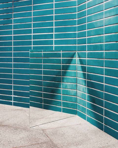 Mirror On Floor Against Wall