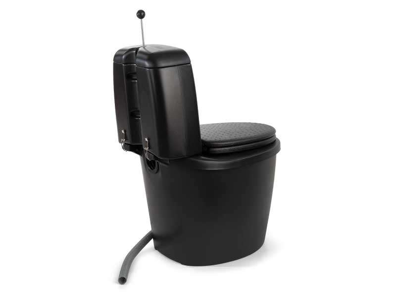 Drain via an external pipe that exits via the back of the toilet unit