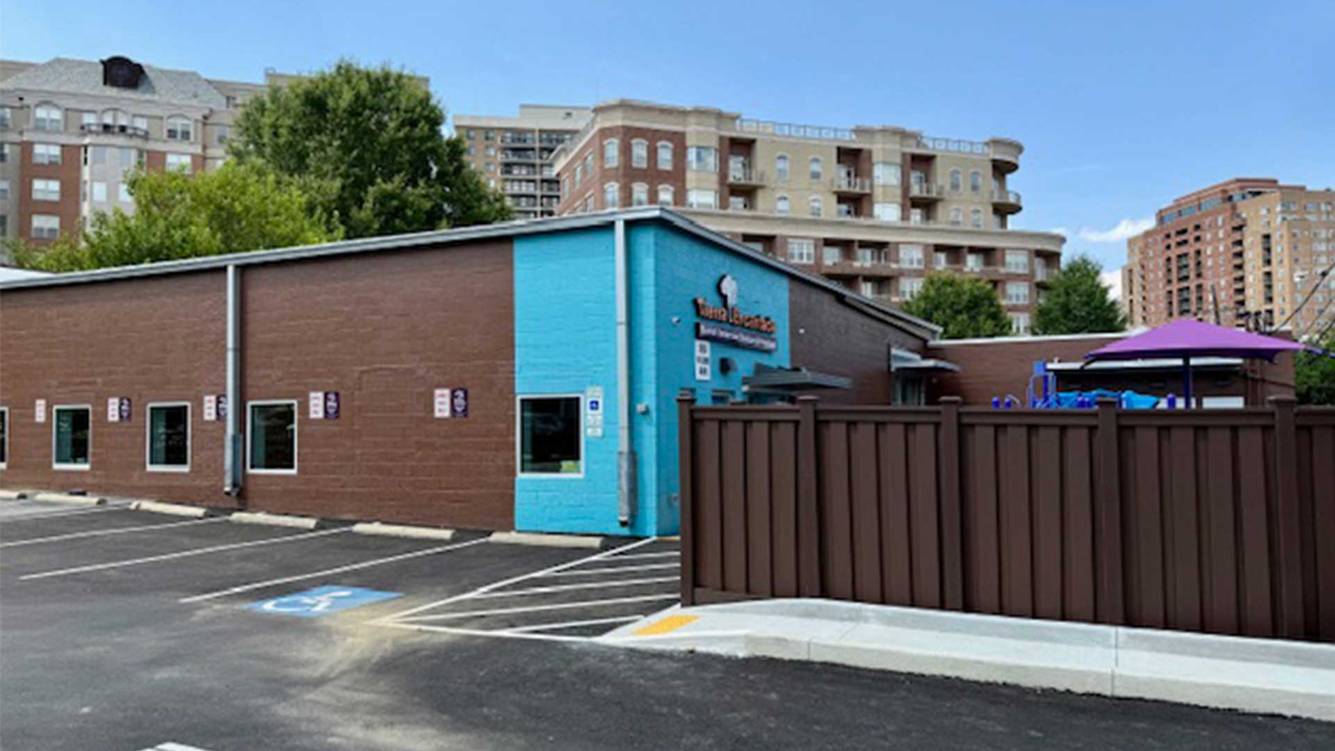 Tierra Encantada Arlington exterior of building and parking lot