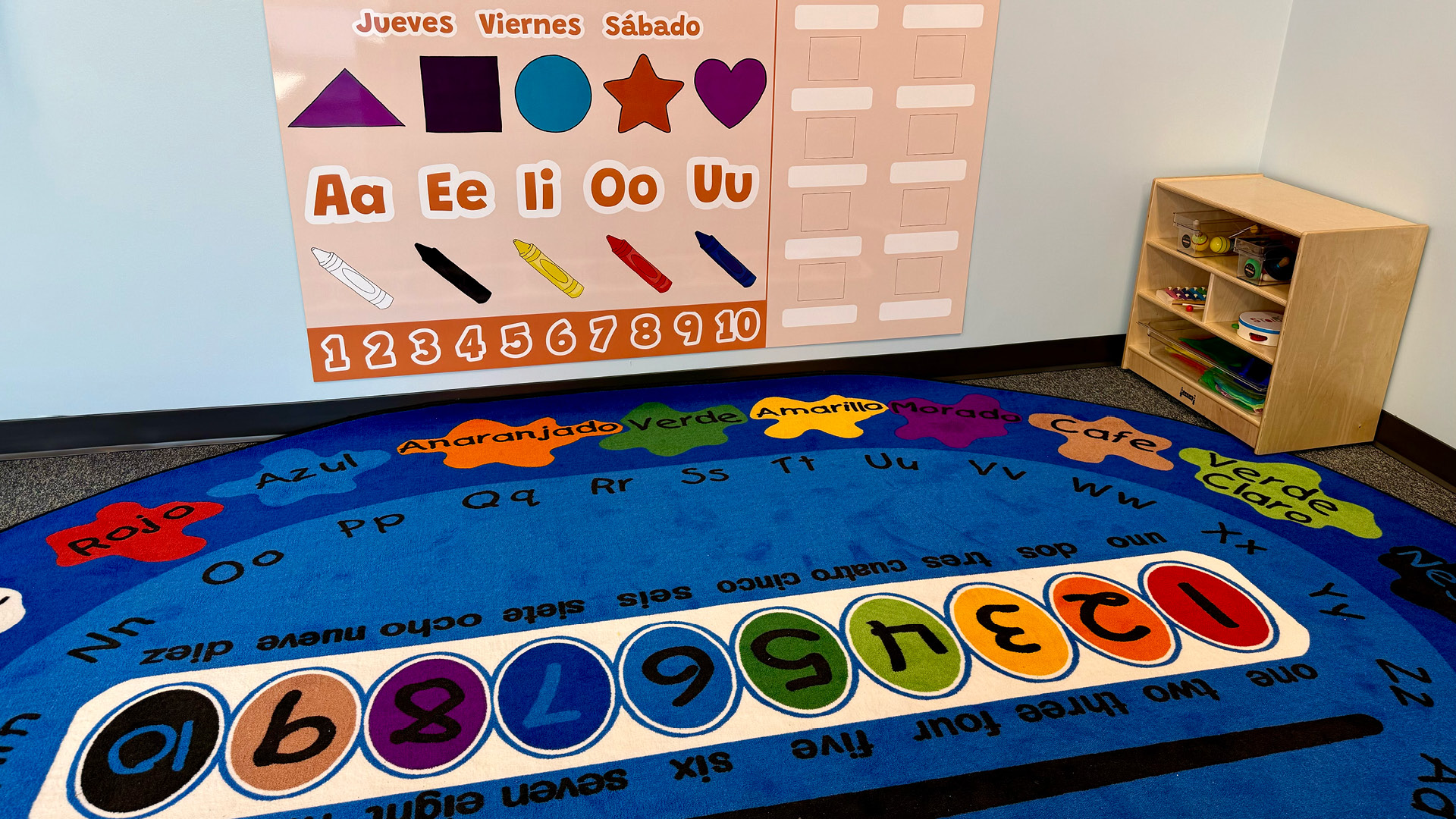 Tierra Encantada play area with blue mat