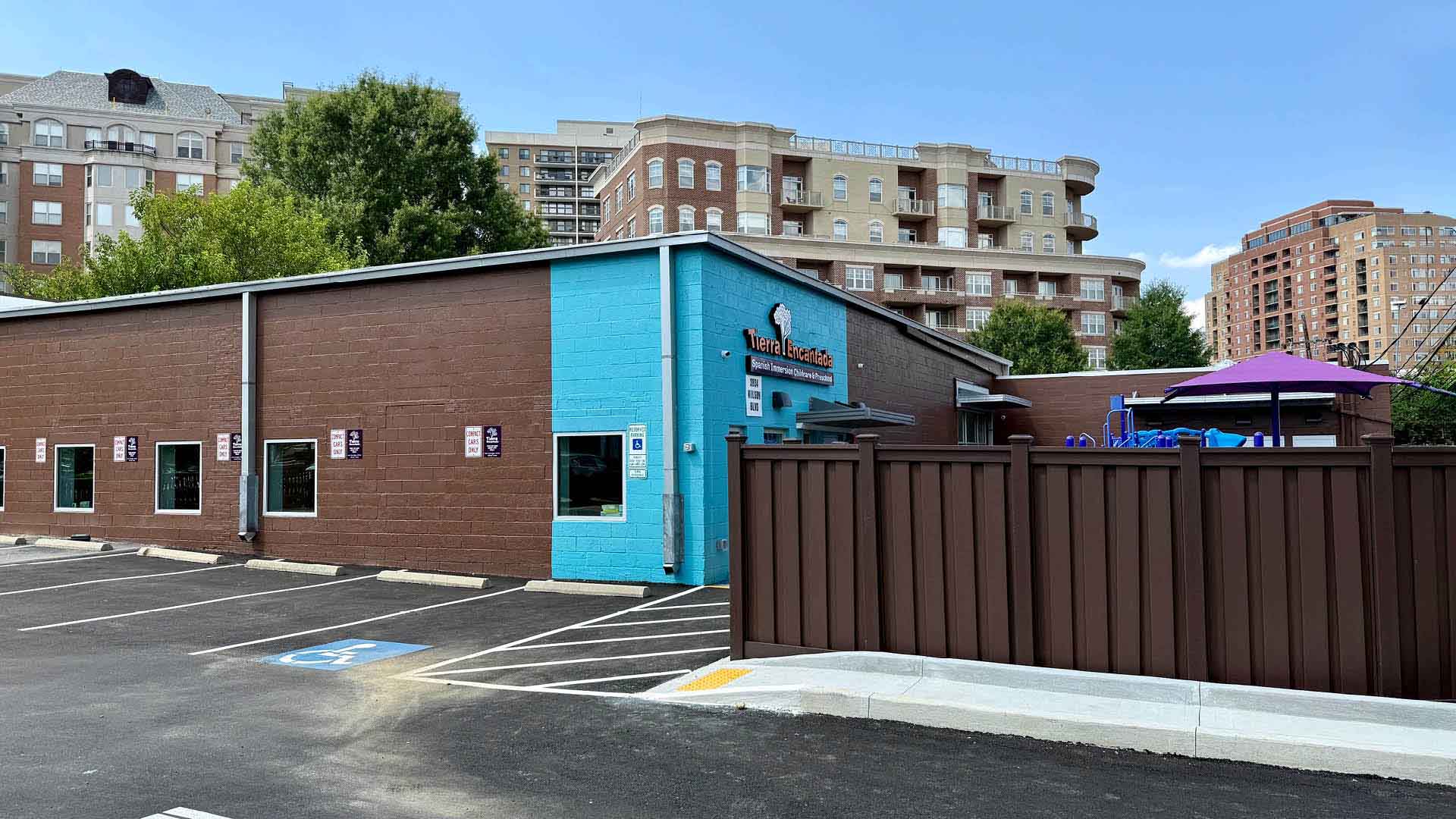 Tierra Encantada Arlington exterior of building and parking lot