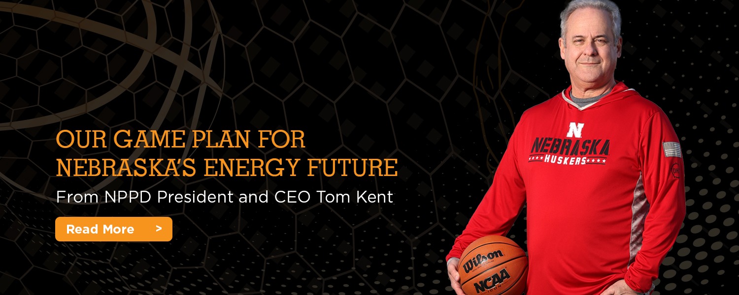 Tom Kent, President & CEO, with a basketball in his hand