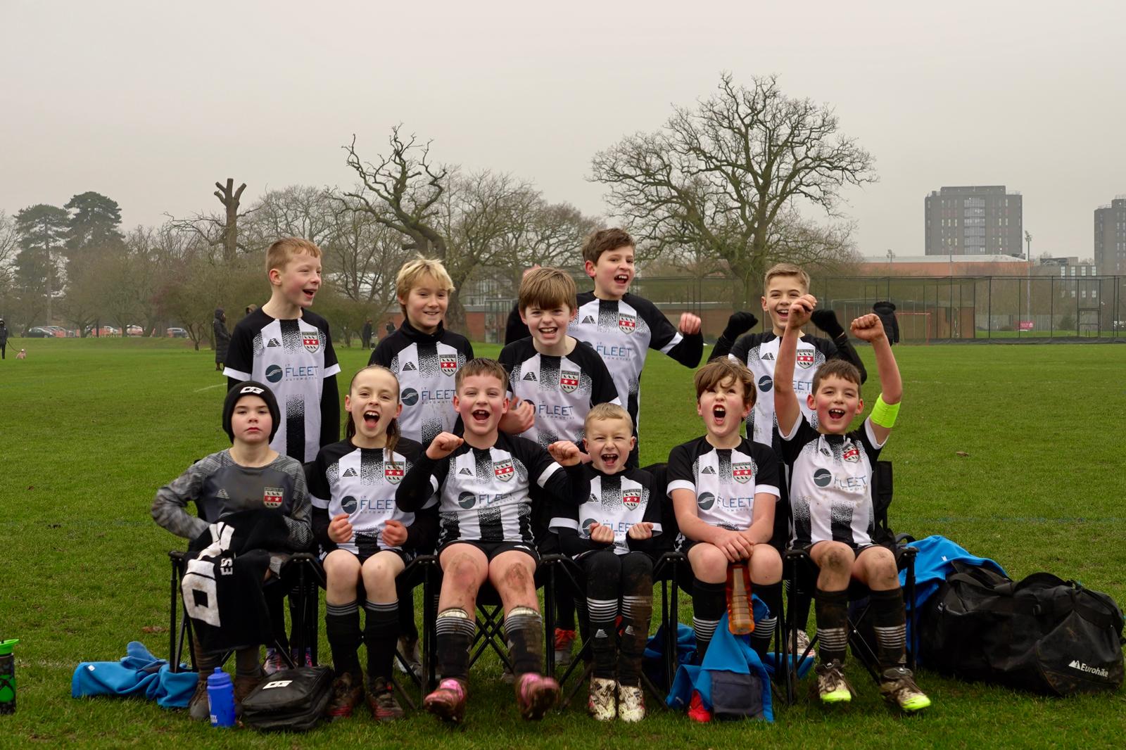 Our most recent team photo celebrating the win!