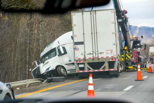 Trucking accident, truck crossed over to the side of the road. 