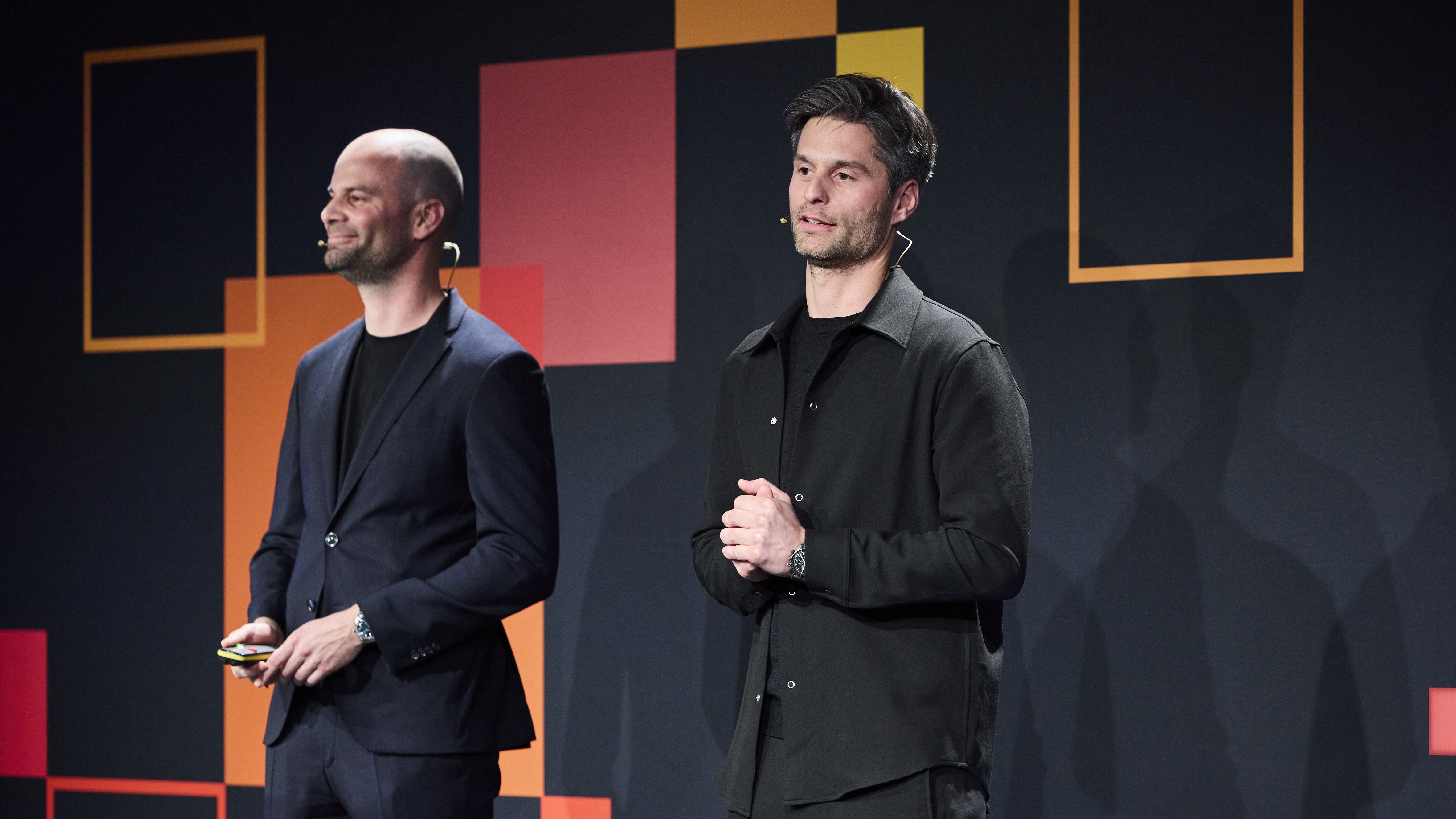 Founder and CEO Patrice Gruner with his brother Tizian Gruner during a presentation at a PWC event.