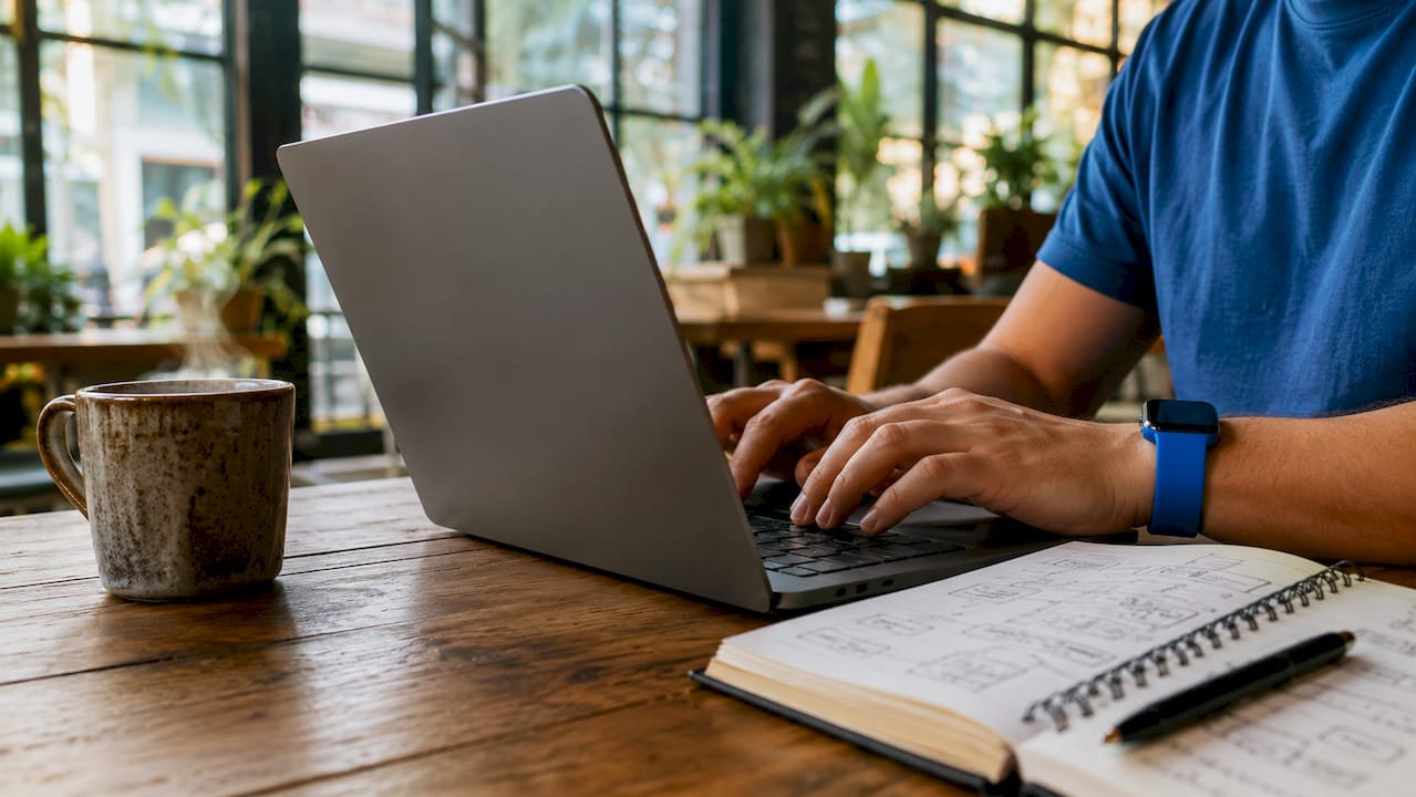Hands typing to automate security testing