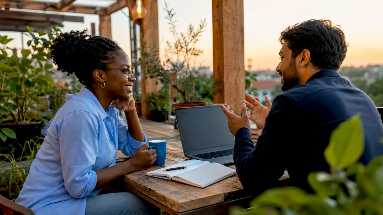 Professionals discussing hosting impact