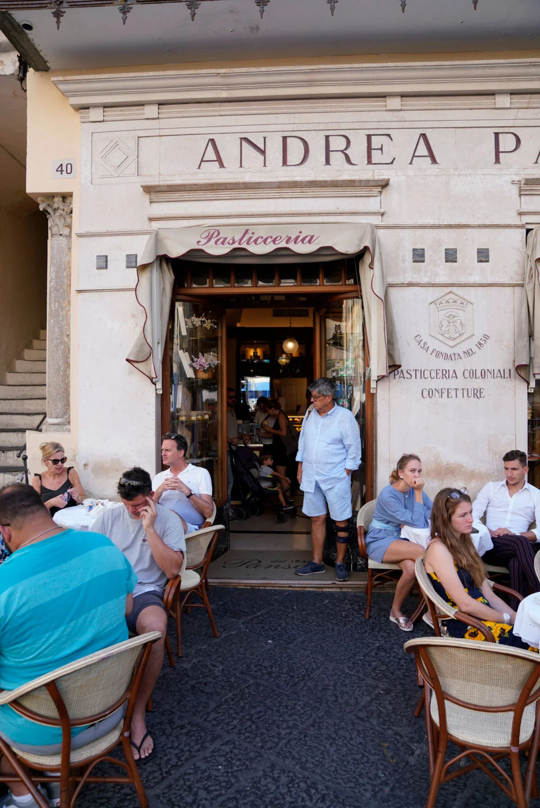 Visitors outside Andrea Pansa pastry shop in Amalfi