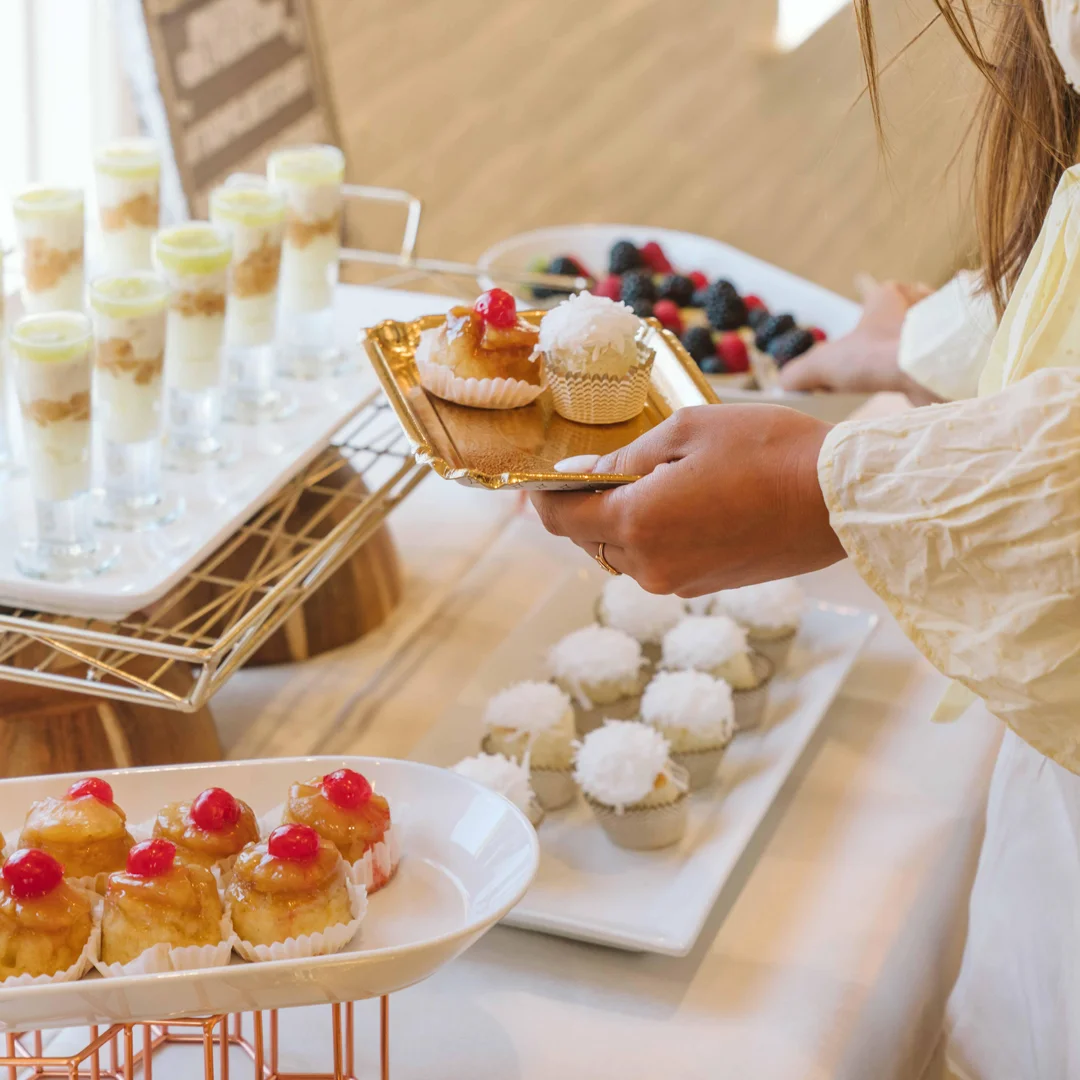 Assorted miniature desserts arranged on a buffet table