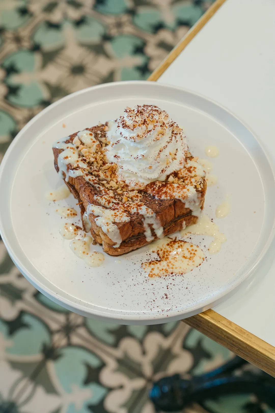 Hazelnut cappuccino French toast with whipped cream and chocolate