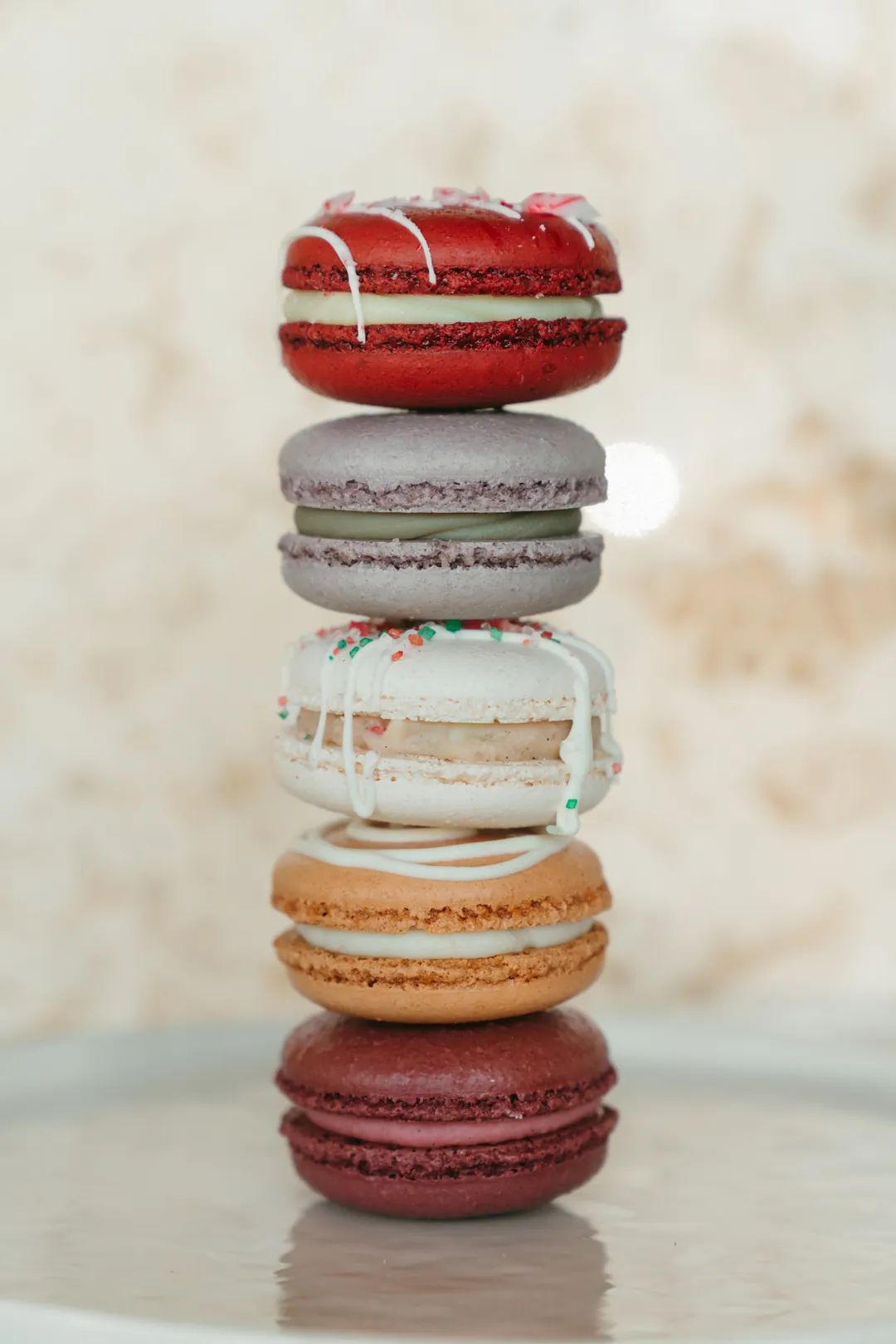 Stack of five assorted macarons