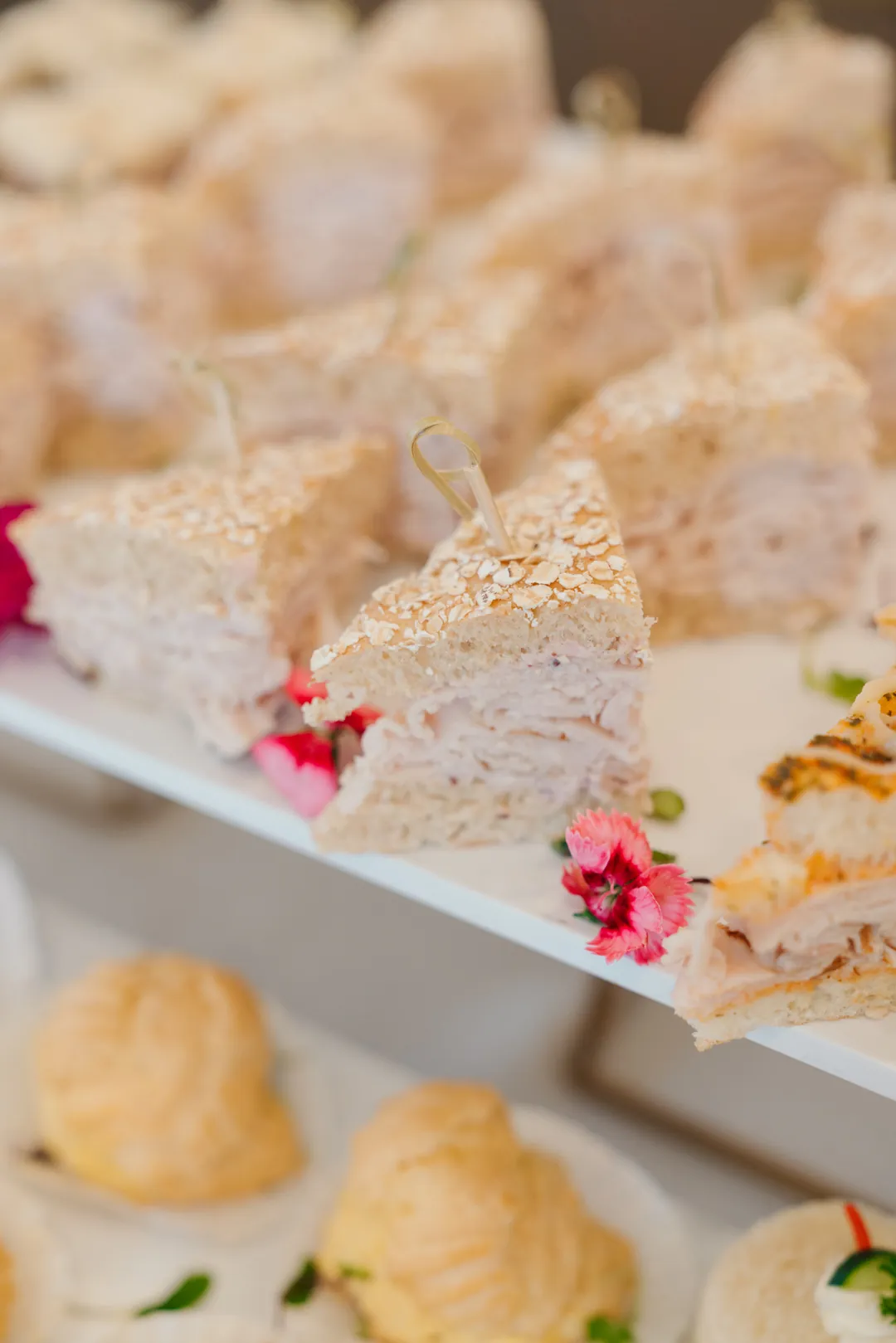 Turkey tea sandwiches on oat-topped bread