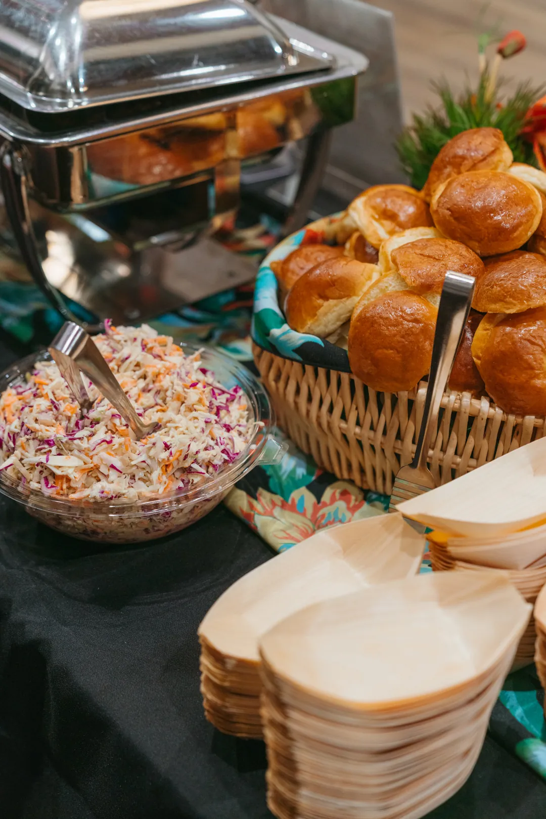 Slider rolls, apple slaw, and serving trays at the Ellie’s Table booth